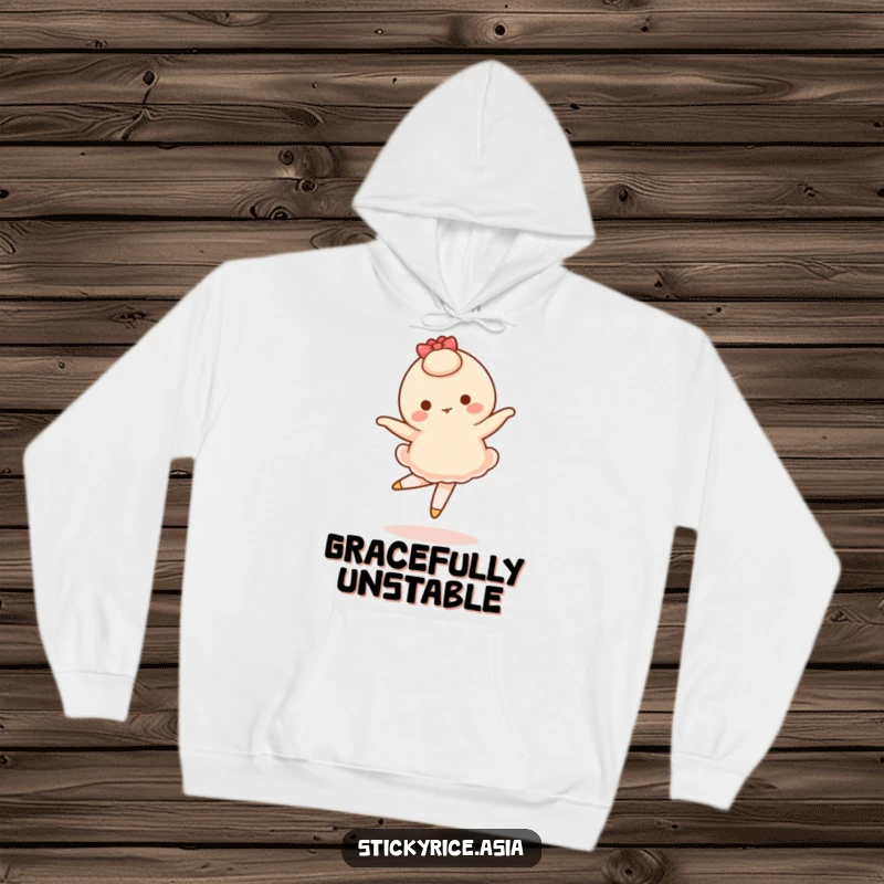 Funny hoodie with a wobbly mochi character attempting a ballet pirouette, offering warmth and humorous inspiration.